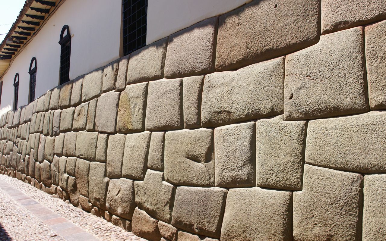 Repointing stone walls for historic preservation in Junction, NY.